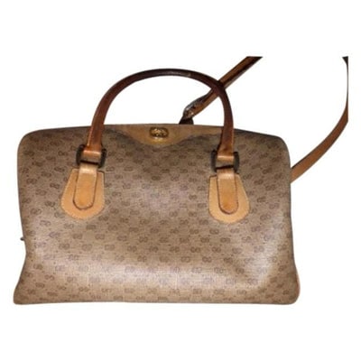 Gucci Vintage Pursesdesigner Purses Shades Of Brown With Small G Logo Leathercoated Canvas Satchel: For sale is a vintage, Gucci, brown micro Guccissima print coated canvas and camel leather two-way style Boston bag satchel with a detachable shoulder strap, gold hardware, and a timeless style! This 