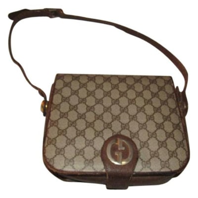 Gucci Vintage Pursesdesigner Purses Brown Large G Logo Print Coated Canvas And Leather Leathercanvas: ONE OF A KIND VINTAGE GUCCI!!For sale is a RARE, unique, mod, Gucci, brown Guccissima print coated canvas and brown leather, '1973' style top handle shoulder bag with a gold GG, bottom, flap snap lock