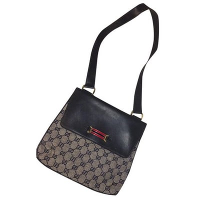 Gucci Vintage Pursesdesigner Purses Navy Leather And Large G Logo Print Canvas With An Enamel Accent: * For sale is a Gucci, dark navy blue leather & large G logo print canvas, shoulder bag/messenger bag in great condition with an envelope flap top and a gorgeous enamel accent at the snap closure!