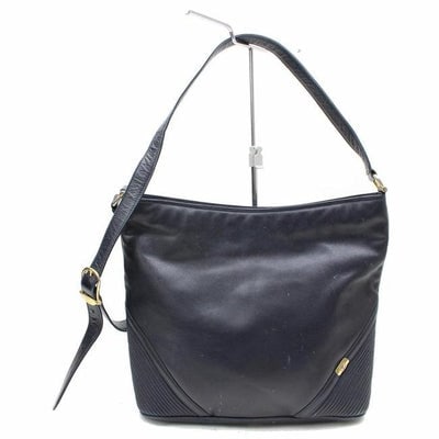Gucci Vintage Purses Blue Leather Hobo Bag: For sale is a vintage, Gucci, navy blue leather, top zip, bucket shaped, hobo style shoulder bag with dimensional navy diagonal stripes at the corners! This is a quality classic from Gucci that will b