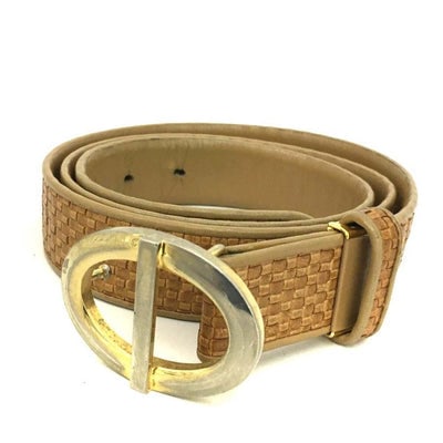 Dior camel intrecciato leather belt w oval two-tone CD buckle: For sale is an early, Christian Dior camel intrecciato leather belt with an oval two-tone CD buckle, a hook that slides into a hole to secure it, and three holes at 36", 37", and 38"! The belt is a ra