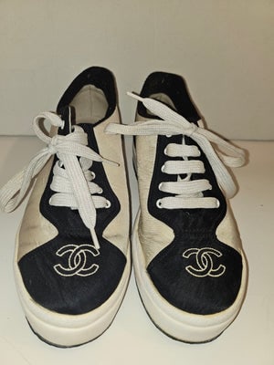 Chanel ivory & black low top sneakers with box!: STRAIGHT FROM ITALY! For sale is a pair of like-new Chanel ivory and black low top sneakers, complete with their original box. These stylish sneakers combine timeless elegance with everyday comfort, m