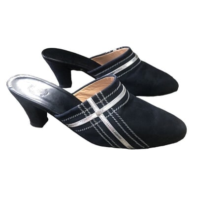 Gucci 1970s- 80s black silk over leather metallic shoes: For sale is a pair of vintage, Gucci, size 7B, black satin/silk over leather, closed, almond toe, mule style heels with a geometric design of white contrast stitching, ribbon, and chrome GG accents! S