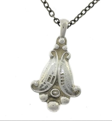 Georg Jensen 1998 sterling signature necklace with diamond: For sale is an iconic Georg Jensen 1998 sterling signature necklace featuring a modernist floral pendant with diamond accent on a handmade chain. Each year, Georg Jensen releases a limited signature p