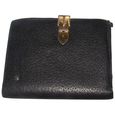 Gucci Black Textured Leather Vintage Wallet: For sale is a vintage, Gucci, black leather, bi-fold style, wallet with a gold 'belt buckle' clasp, hinged clasp, lots of card slots, and a large snap close change purse! This classic vintage Gucci wa