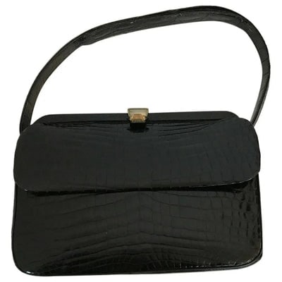 Lancel dark navy crocodile leather boxy satchel style purse: For sale is a vintage, Lancel, dark navy crocodile leather, boxy, satchel style purse with bold gold hardware, a leather strap, a hinged, top snap closure, and Italian made quality! This vintage purse