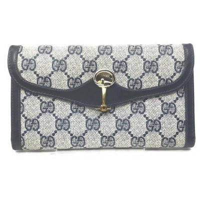 Gucci Navy Guccissima Horse Bit Leather Wallet: For sale is a RARE, Gucci, navy blue leather and navy Guccissima print coated canvas, tri-fold style wallet with a horse-bit closure, lots of slots, and a change purse with a GG logo clasp! This is a 