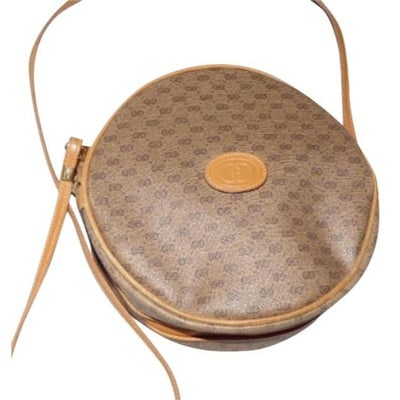 Gucci Vintage Camel Leather And Small G Logo Print Coated Canvas In Shades Of Browns: For sale is a Gucci, RARE, small G logo, leather/coated canvas, round, shoulder bag in browns with top zip in excellent condition! This is a coveted, hard to find style from Gucci that has a edgy mod 