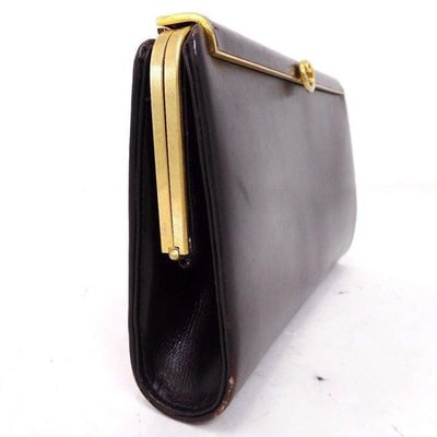 Gucci Chocolate Brown Leather Interlocking G Clutch: For sale is an authentic, rare, 1960's, AMAZING, Gucci, mod, brown leather, hinged opening, clutch style purse with a sleek linear, gold and suede, latch top clasp with an interlocking GG center accen