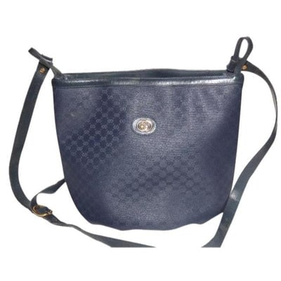 Gucci Vintage Blue Small G Logo Coated Canvas And Leather Satchel: For sale is a vintage, Gucci, blue small G logo coated canvas and leather, ex-large size, bucket style satchel, cross body or shoulder bag with multiple interior compartments! It is a unique take on a