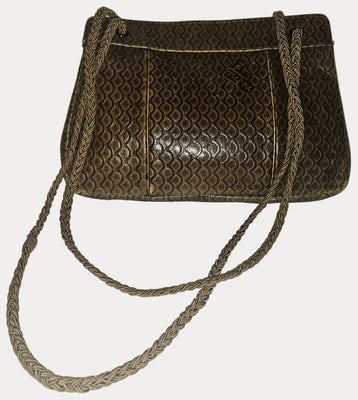 Fendi brown tooled leather pouch purse with adjustable strap: For sale is a rare, 1970s , Fendi brown tooled leather pouch purse with an adjustable braided corde strap, expandable sides, & a logo lined interior. This is a one of a kind iconic style by 