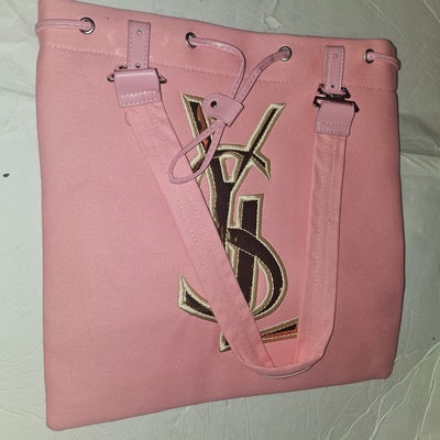 YSL NEW old stock, pink canvas & leather tote with chrome hardware & YSL logo in gold patent leather: For sale is a YSL NEW old stock, pink canvas & leather tote with chrome hardware , YSL logo in gold patent leather, & drawstring top closureThe bag is a pink canvas, two handle, satchel or tot
