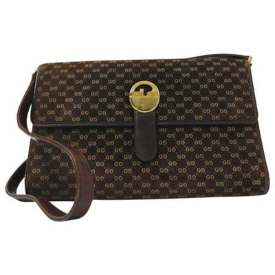 Gucci Tan Micro Guccissima Print on Brown Leather Two Way Style Clutch/ Shoulder Bag: For sale is a RARE, early Gucci, brown suede with a lighter Micro Guccissima print and brown leather, rectangular, two-way style- shoulder purse or clutch style with a bold, gold early GG logo snap st