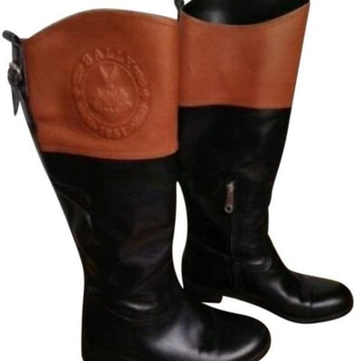 Bally Black & Brown Leather Riding Boots: For sale is a pair of vintage, Bally, size 6, black and brown leather riding boots with partial zip closures, rounded toes, low, block 1" heels, and the Bally 1851 stamp embossed in the leather!