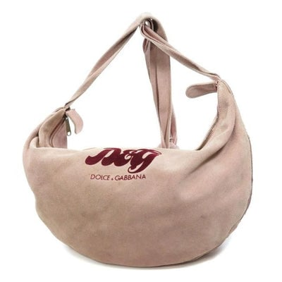 Dolce And Gabbana Pink Suede XL Hobo Bag With Dark Red Velvet Logo: For sale is a Dolce&Gabbana, pink suede, XL top zip hobo style, cross body/shoulder bag with a zip top closure, long, knotted strap, brass studded bottom accents, and a dark red Dolce&Gabbana 