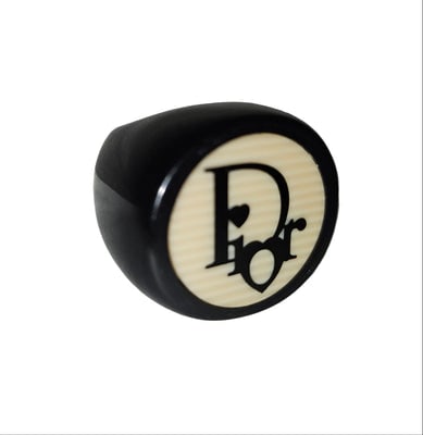 Dior Black & Ivory XL Round Logo Inlaid Ring: Elevate your vintage jewelry collection with this exceptional Christian Dior ring, a coveted piece from the iconic 1990s era. Resin pieces from Dior are some of the most coveted & hardest to find!