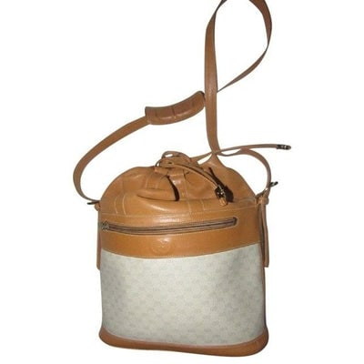 Gucci Vintage Pursesdesigner Purses Camel Leather And A Camel Small G Print On Ivory Coated Canvas S: For sale is an unusual, vintage, Gucci, camel leather and a camel small G print on ivory coated canvas, drawstring top bag with a structured base that is attached to a looser tapered leather drawstrin