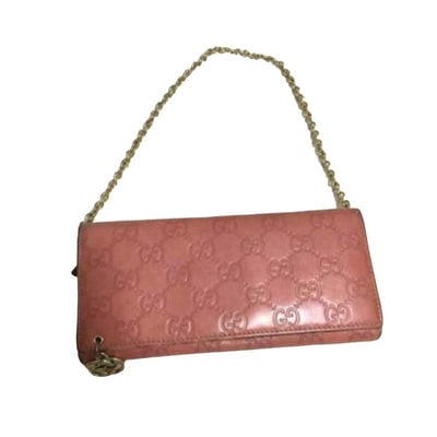 Gucci, salmon colored embossed Guccissima print leather, XL size, wallet on a removable chain: For sale is a Gucci, salmon pink colored embossed Guccissima print leather, XL size, wallet on a removable chain with a zip around change purse, checkbook holder, and lots of card and bill slots! This
