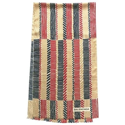Balenciaga Blue Tan Red White Tribal Silk Scarf: For sale is a RARE, Balenciaga, blue, tan, red, and white tribal print, 52" long x 15" wide, 100% silk scarf with rolled edges, a fringed hem, and a double-sided print!This Italian made 100% silk scar