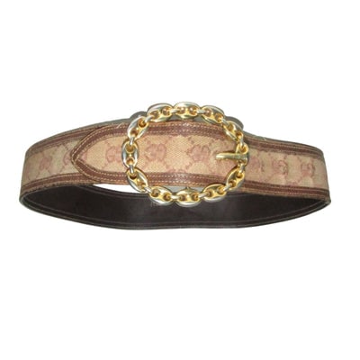 Early brown Guccissima leather belt w a gold Gucci link buckle: For sale is an early, vintage Gucci, size 85, brown Guccissima print leather belt #7547 with an XL oval shaped, gold Gucci link buckle. This belt is amazing! The belt is made of brown Guccissima print