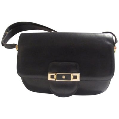 Bally Navy Blue Leather Shoulder Bag: For sale is a vintage, Bally, buttery soft, navy blue leather, envelope style, shoulder bag with a snap closure, an exterior pocket, two strap settings, and a roomy three compartment interior! It is a
