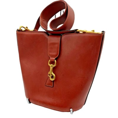 Gucci Red Leather Jackie Bucket Bag w Gold Hardware: For sale is a Gucci Red Leather Jackie Bucket Bag with gold over sterling silver hardware, a removable strap, multiple compartments, & great style! The Tom Ford era Jackie Bucket purse is made of 