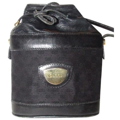 Gucci Early Cross Body Bucket Purses Black Small G Logo Print Logo Print Canvas And Black Leather Wi: For sale is an unusual, early Gucci, black micro Guccissima print canvas and black leather, petite, cross body bucket bag with a structured, leather and canvas base is attached to a looser tapered