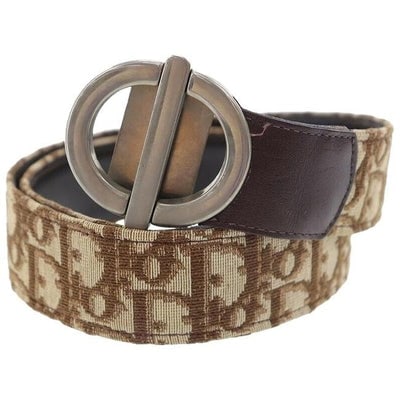 Dior Brown Trotter Print Leather Belt w Chrome Buckle: For sale is an early, Christian Dior brown trotter print canvas and brown leather belt with a round, chrome CD buckle, a hook that slides into a hole to secure it, and three holes at 32", 33", and