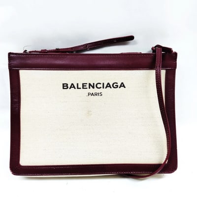 Balenciaga canvas & leather two-way classic logo purse: For sale is a Balenciaga canvas & leather two-way classic logo purse. It's a timeless sportier look from Balenciaga that will always be in style! This iconic Balenciaga two-way purse combines dura