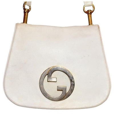 Vintage 1970s Gucci white textured leather Blondie style saddle bag with XL gold GG logo cutout in (1 of 4)