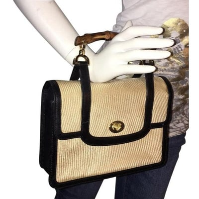 Gucci Black Leather And Ivory Raffia Lunch-box Satchel With Bamboo Hanle: ONE OF A KIND VINTAGE GUCCI! For sale is a RARE, collectible, mod, early Gucci, black leather and ivory raffia like fabric, lunchbox style satchel with a bamboo handle! It is the original 1960's class