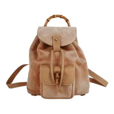 Tom Ford era, Gucci, tan colored, suede and leather, messenger bag/backpack: For sale is a Tom Ford era, Gucci, hot pink colored, suede and leather, messenger bag/backpack with an exterior pocket, drawstring top, two shoulder straps, a bamboo top handle, and gold and bamboo ac