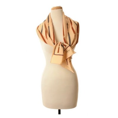 Gucci Blue Brown Gold Equestrian Logo Print Silk Scarf: For sale is a Gucci, equestrian print, 58" x 11", 100 % silk scarf in blue, yellow, burnt orange, brown, gold and black on an ivory or tan background with a GG logo design, a multi-colored striped sna
