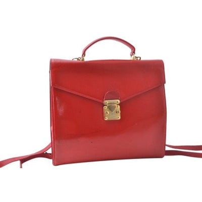 Fendi Red Leather Early Kelly Style 3 Way- Satchel Messenger Backpack: For sale is a one of a kind, Fendi, red patent leather, two-way- satchel/messenger bag/backpack Kelly style purse with an envelope top closure, an attached, shorter, handheld handle on top, two remova