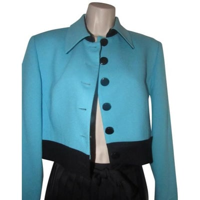 Dior Turquoise Blue And Black Wool Blazer: For sale is a fabulous, Christian Dior, size 8, structured, turquoise blue and black wool, button front, short blazer! This blazer from Dior draws on inspiration from the past and has an edgy modern s