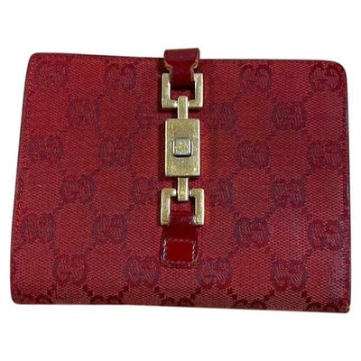 Gucci Red Guccissima Print Gold Jackie O Style Wallet: For sale is a Gucci, red Guccissima print canvas and red leather, bi-fold wallet with gold, Jackie O style, push button closure and gold accents, and lots of slots for your cards! This is a great look