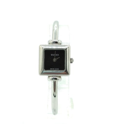 Swiss-made Gucci 1900 L series watch with a square opalescent black stainless steel dial, 7.5" long,: Up for sale is a Swiss-made Gucci 1900 L series watch with a square opalescent black stainless steel dial, 7.5" long, sterling silver strap and 3 atm sapphire quartz. Gucci's watch is the one of their