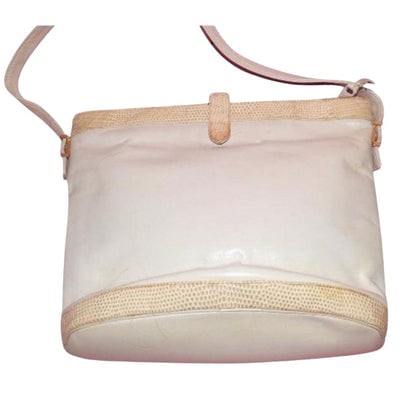 Unique, vintage, Givenchy, bucket/satchel style handbag in soft white leather with beige alligator: For sale is a unique, amazing, Givenchy, bucket/satchel style handbag in soft white leather with beige alligator trim accents! This is an unusual and very modern style that would be perfect as a signa