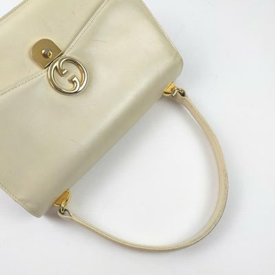 Vintage, Gucci, cream leather, 1973 top handle style purse with gold tone accents!: * For sale is a unique, RARE, mod, Gucci, cream leather, single strap, 1973 top handle style purse with gold tone accents and lots of pockets! It is a unique style that would be a great used as a sign