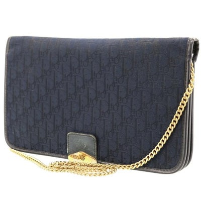 Dior Two Way Purses Navy Trotter Print Canvas And Navy Leather Shoulder Bag: For sale is a vintage, Christian Dior, navy trotter print canvas and navy leather, two-way style shoulder purse or clutch with a bold, gold Dior snap closure, envelope top, multiple compartments, and 
