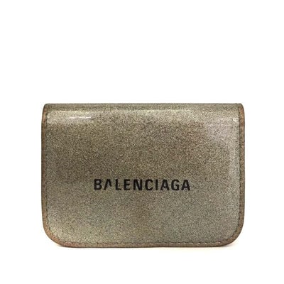Balenciaga, gold leather wallet with two compartments and a snap close change purse & tri-fold: For sale is a Balenciaga, gold leather wallet with two compartments and a snap close change purse! This is a great looking, sleek leather wallet from Balenciaga with a very intelligent design! This