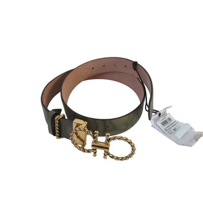 Ferragamo Double Gancini Logo Green Leather Belt: Salvatore Ferragamo Coil Logo Embossed Women's Leather Belt - NWT. The Coil Logo Olive Moss Green Embossed Leather belt proves that it's all in the details. This playful accessory from Salvatore Ferra