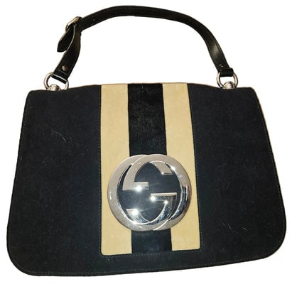 Gucci black velvet over leather Blondie saddle bag with tan stripes: For sale is a Gucci black velvet over leather Blondie saddle bag with tan stripes, chrome hardware, an XL chrome GG cutout, an expandable bottom, and iconic Gucci style! This modern take on the origin