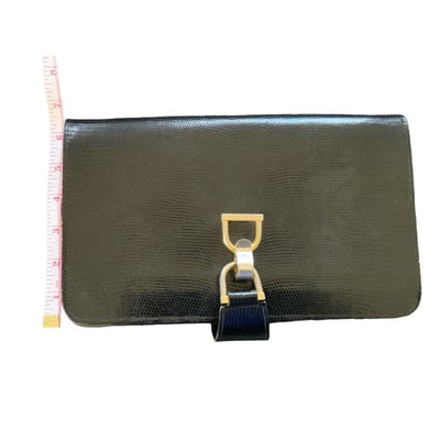 Gucci rich midnight blue lizard skin leather two-way purse: One of a kind, vintage Gucci clutch! For sale is a one of a kind, 1960's mod, Gucci two-way, cross body, shoulder bag, or clutch made of rich, midnight blue, lizard skin leather with a gold tone, hing