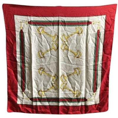 Gucci Red Green Gold Equestrian Print Silk Scarf: For sale is a Gucci, equestrian print, 35" square, 100 % silk scarf in red, green, gold, and black on a white background with a wide red border, a red and green striped design, and horse-bit accents! 