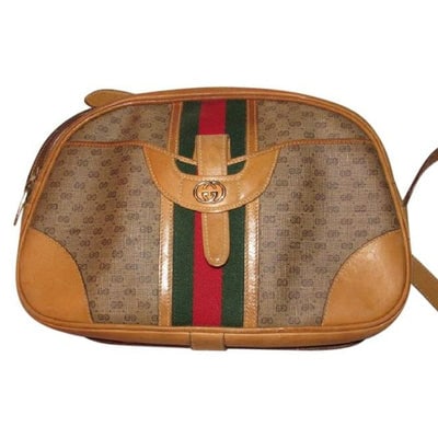 Gucci Gucci, unique, RARE, camel leather & brown small G logo, coated canvas, top zip, camera: For sale is a vintage, Gucci, unique, RARE, camel leather & brown small G logo, coated canvas, top zip, camera bag/bowler style, cross body/shoulder purse in an unusual bowling bag style with