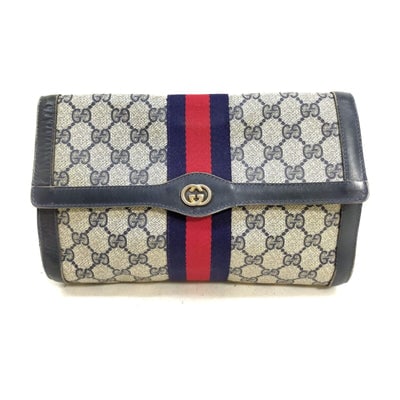 Gucci, navy Guccissima print coated canvas & leather, clutch or cosmetic bag with a red & blue: For sale is a Gucci, navy Guccissima print coated canvas & leather, clutch purse or cosmetic bag with an envelope top, snap closure, and a red and blue Sherry striped center! It is a classic