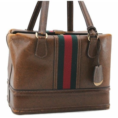 Gucci Top Early Saddle With Sherry Camel Leathergreenred Stripe Shoulder Bag: ONE OF A KIND GUCCI STYLE! For sale is an AMAZING, early Gucci Ophedia line look, square shape, top handle purse in a camel brown leather with red and green Sherry striped center, expandable top, a lo