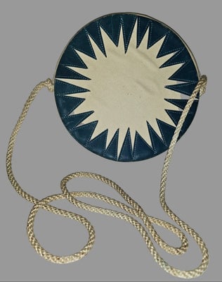 YSL white teal & black early starburst logo design canteen style cross body: For sale is a YSL white teal & black early starburst logo design canteen style cross body from the 1970s to 1980s. The purse has a hard structured round white canteen style body with teal over bla