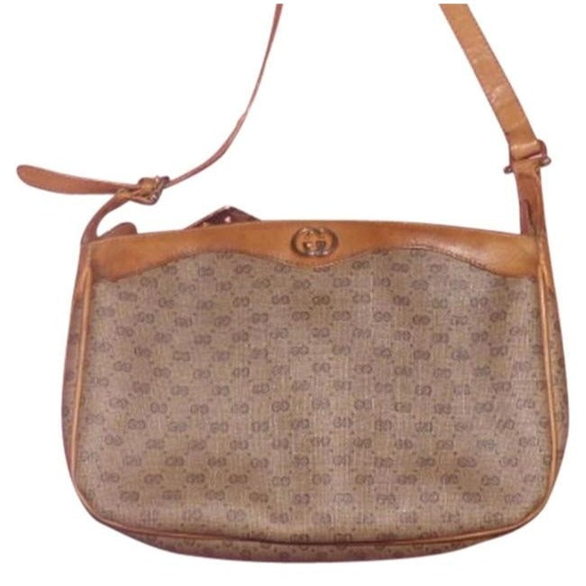 Gucci Vintage Browns Coated Canvas And Leather Shoulder Bag: For sale is a vintage, Gucci, unique, camel leather & brown small logo, coated canvas,top zip, large 'sling style', cross body/shoulder purse! This is the only brown purse you will ever need! You are 